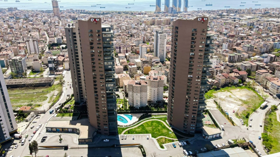 Luxury living in Istanbul's Kartal district with stunning sea views, sky gardens, and prime retail spaces